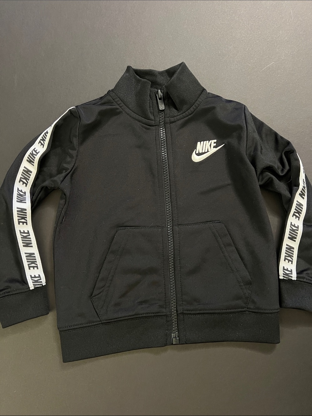 Nike Black Track Jacket with White Logo and Sleeve Tape